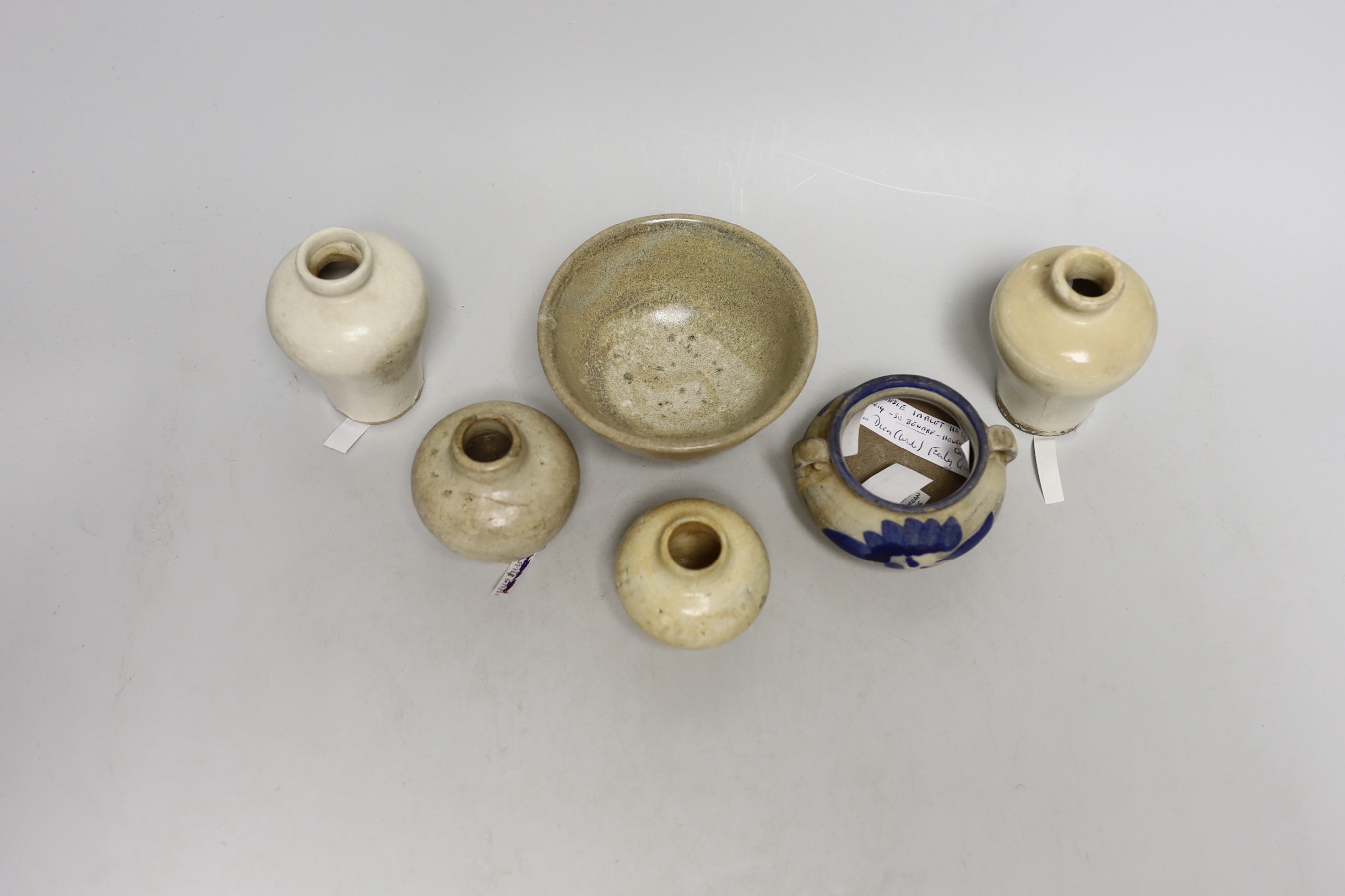 A group of Chinese blanc de chine small jars, Fujian kilns, 15th - 17th century and other vessels, tallest 9.5 cm